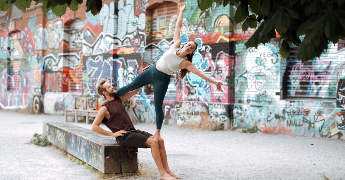 urban acro yoga pose of acroyoga in the event Find the Balance