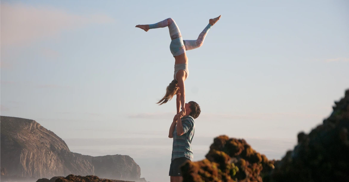 urban acro yoga pose of acroyoga in the event Standing Acro