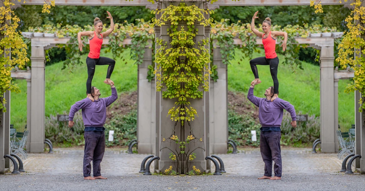 urban acro yoga pose of acroyoga in the event Standing Acro