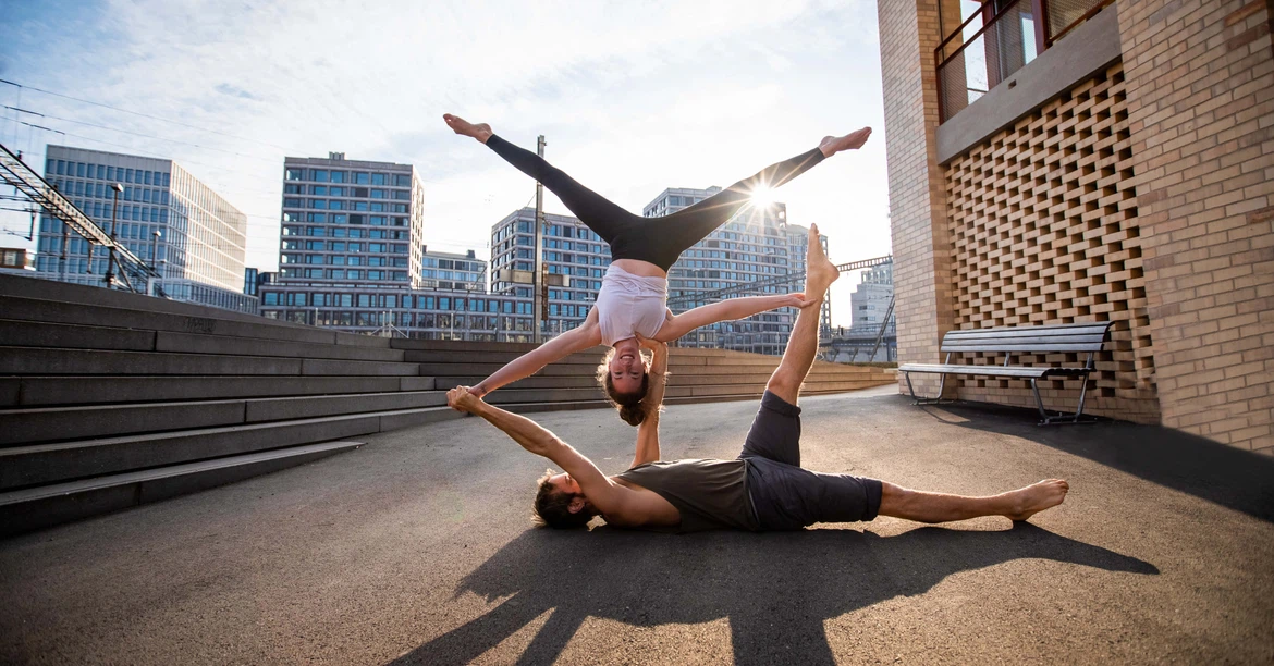 urban acro yoga pose of acroyoga in the event Acroyoga 1x1